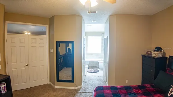 a en suite bathroom with double sink and a mirror