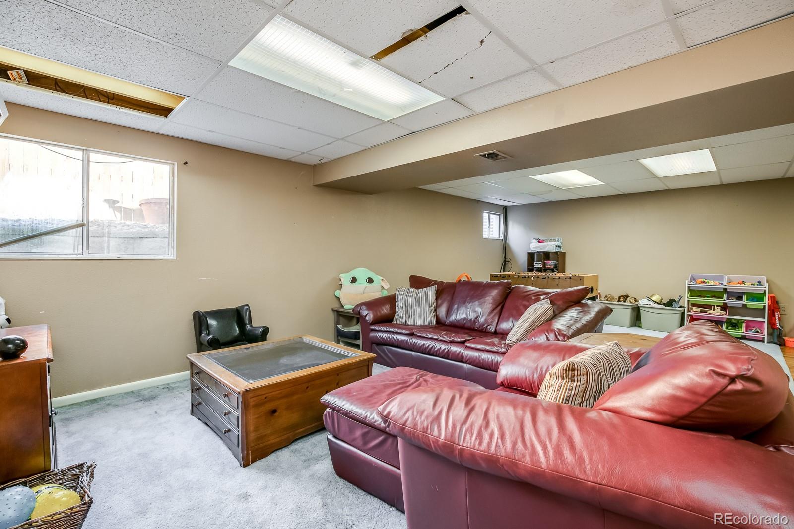 726 Northridge Road Highlands Ranch, CO 80126 - Photo 32 of 40 a living room with furniture