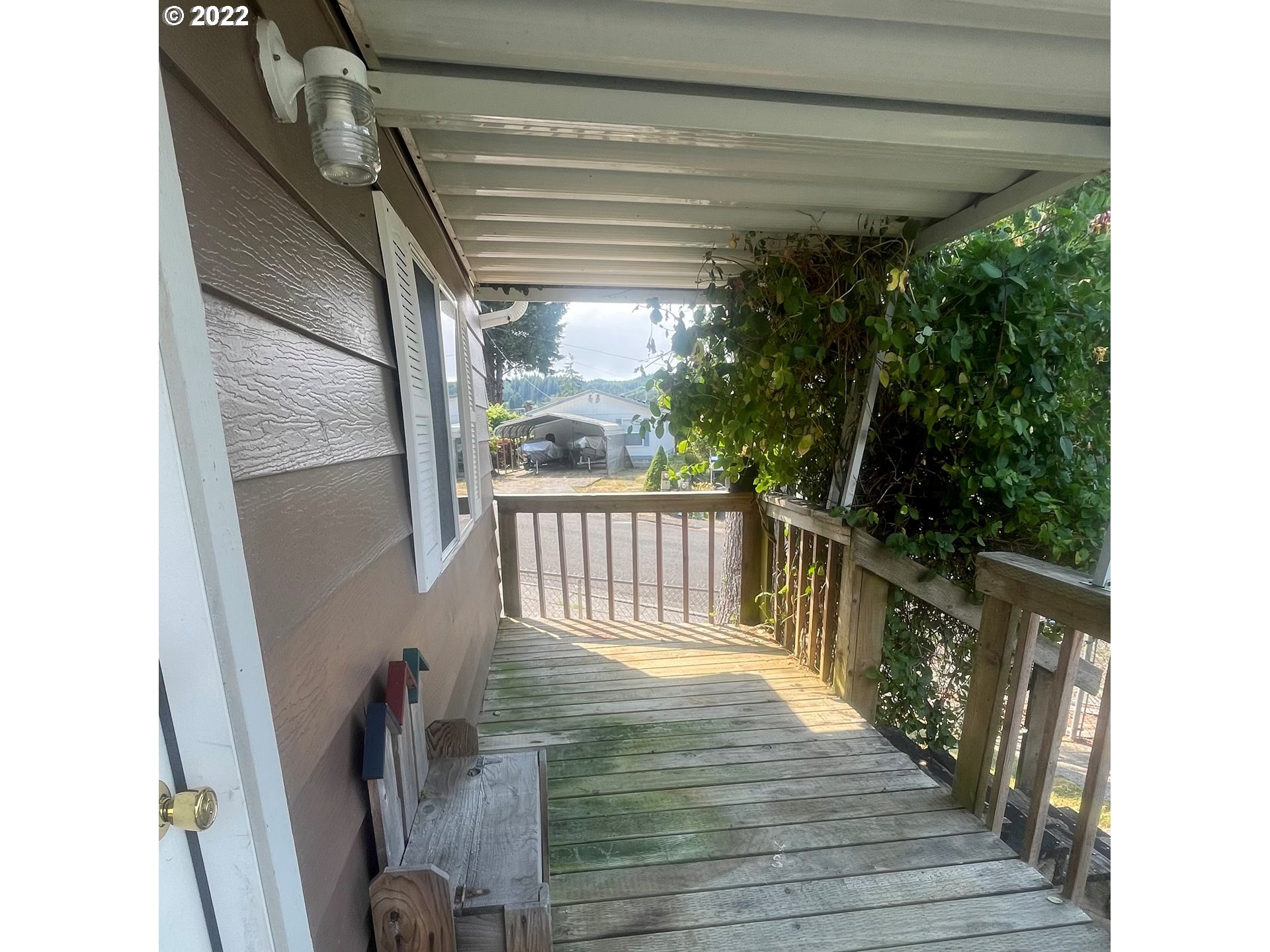 876 Vista Court Reedsport, OR 97467 - Photo 27 of 29 Covered Porch