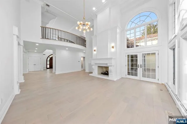 a view of empty room with windows