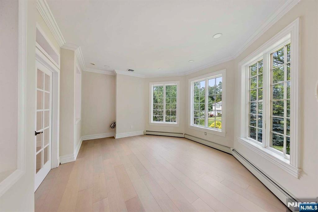 5 Ellen's Way Alpine, NJ 07620 - Photo 15 of 49 a view of a big room with windows and entryway