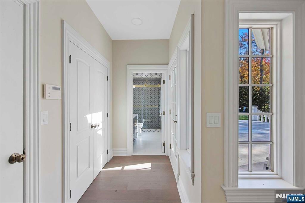 5 Ellen's Way Alpine, NJ 07620 - Photo 24 of 49 a view of a bathroom from a corridor