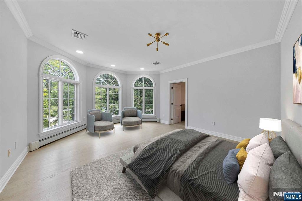 5 Ellen's Way Alpine, NJ 07620 - Photo 35 of 49 a spacious bedroom with a large bed and large windows