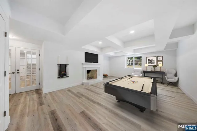 a front view of a residential apartment building with a yard