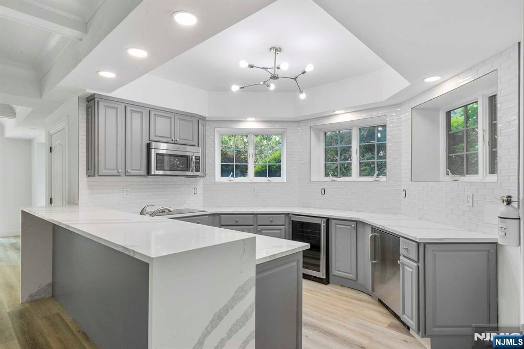 5 Ellen's Way Alpine, NJ 07620 - Photo 45 of 49 a kitchen that has a sink and a stove in it