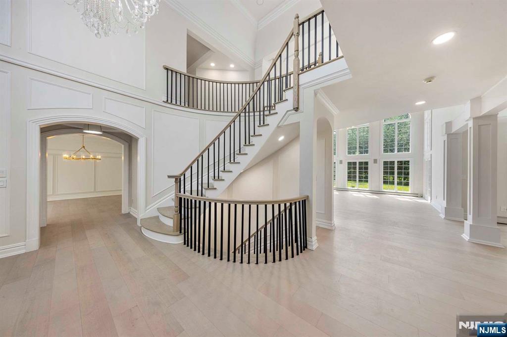 5 Ellen's Way Alpine, NJ 07620 - Photo 10 of 49 a view of staircase with railing and a chandelier