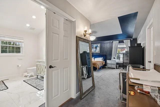 a room with a couch and a window