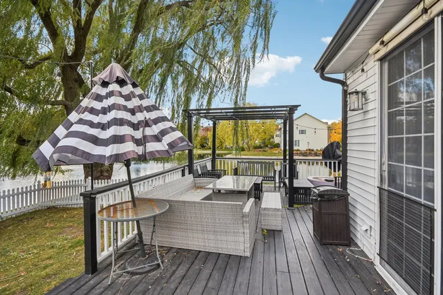 a aerial view of a house with a yard
