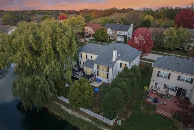 an aerial view of a house with a garden