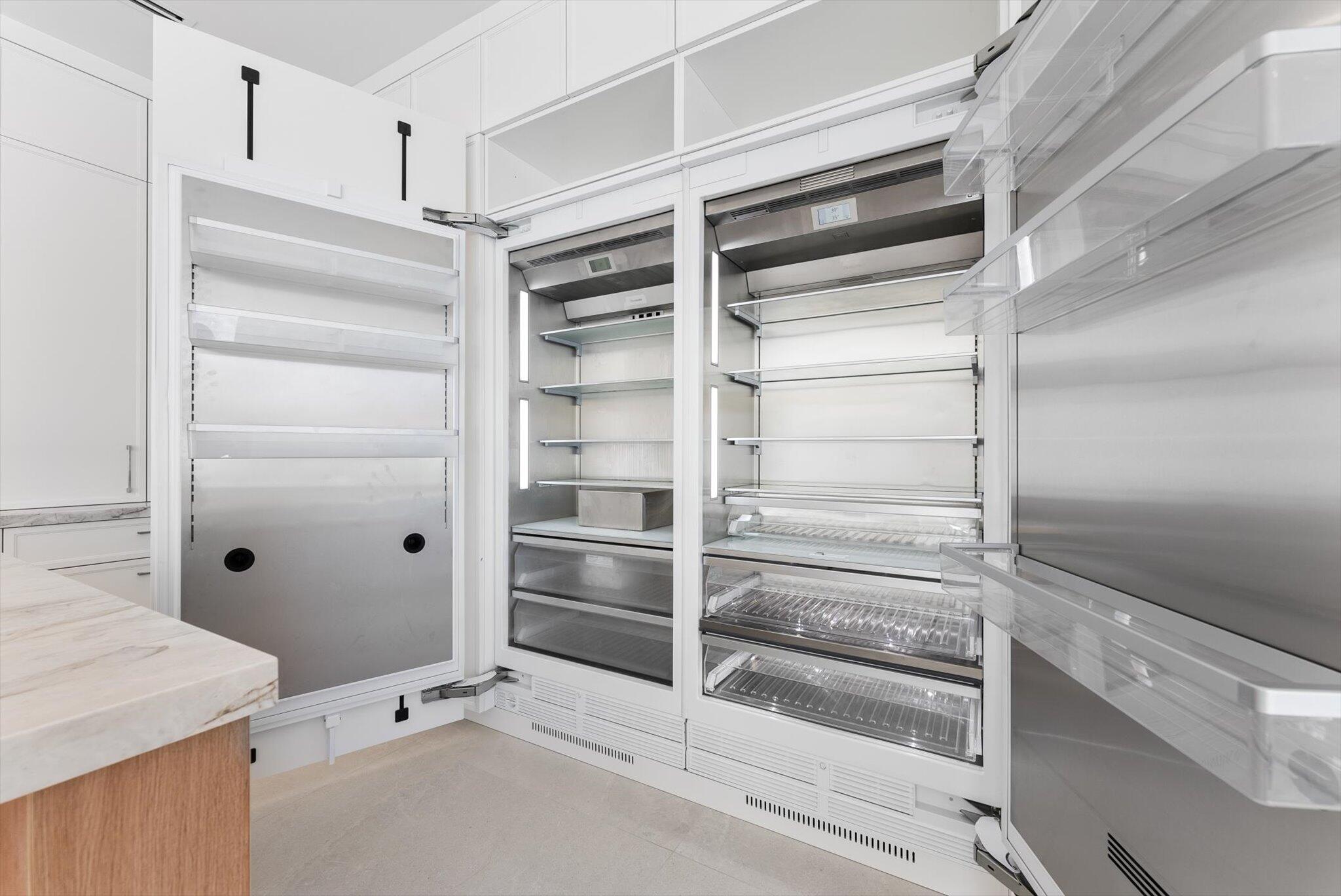 880 Northeast 3rd Avenue Boca Raton, FL 33432 - Photo 20 of 100 a view of walk in closet with empty racks