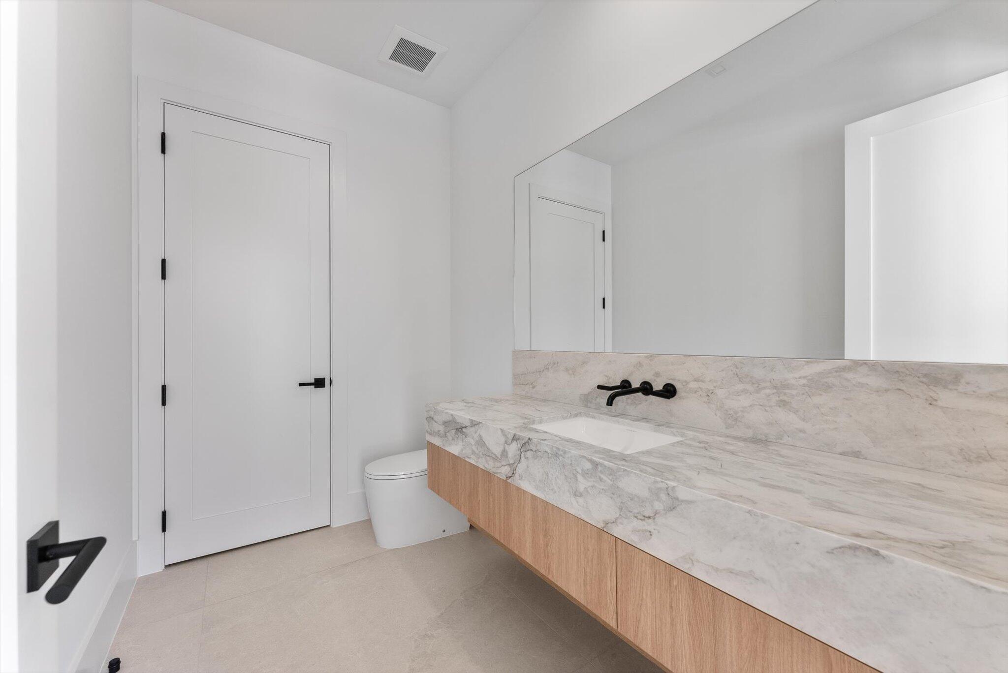 880 Northeast 3rd Avenue Boca Raton, FL 33432 - Photo 29 of 100 Half Bathroom