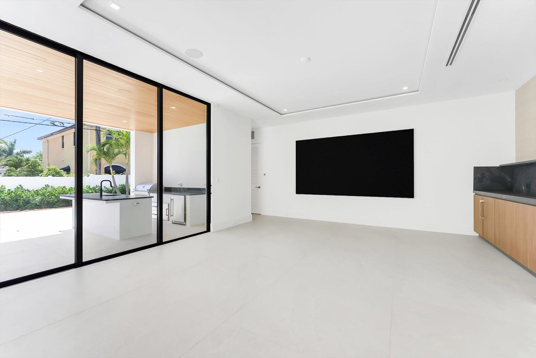 880 Northeast 3rd Avenue Boca Raton, FL 33432 - Photo 30 of 100 a view of an empty room with windows