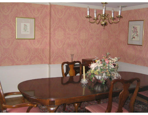 145 Stratford Road Needham, MA 02492 - Photo 5 of 6 a view of a dining room with furniture and wooden floor