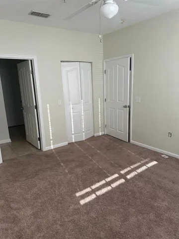 a view of a room with an empty space