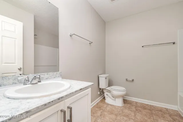 a view of a house with a swimming pool