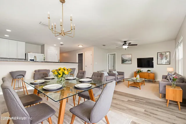 a view of a dining room with furniture