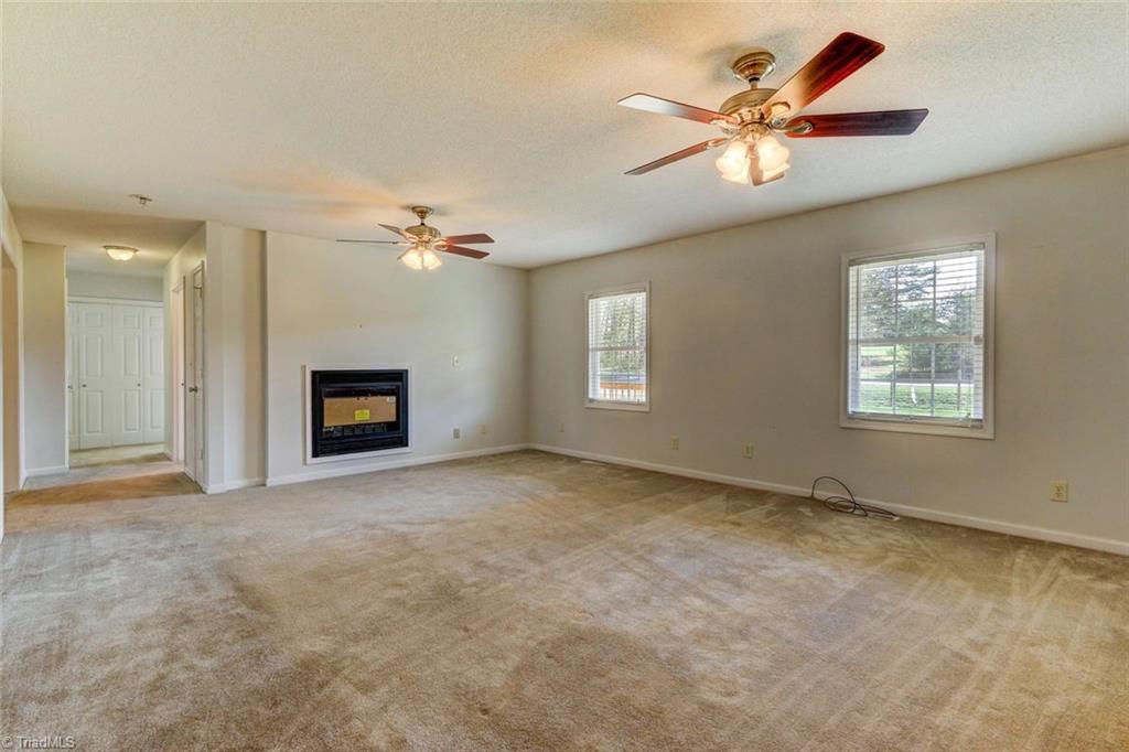 140 Slaydon Road Eden, NC 27288 - Photo 5 of 30 Living room with gas logs