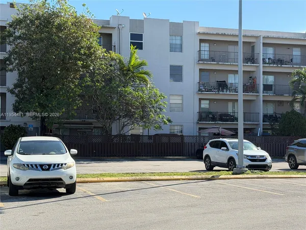 a car parked in front of a building