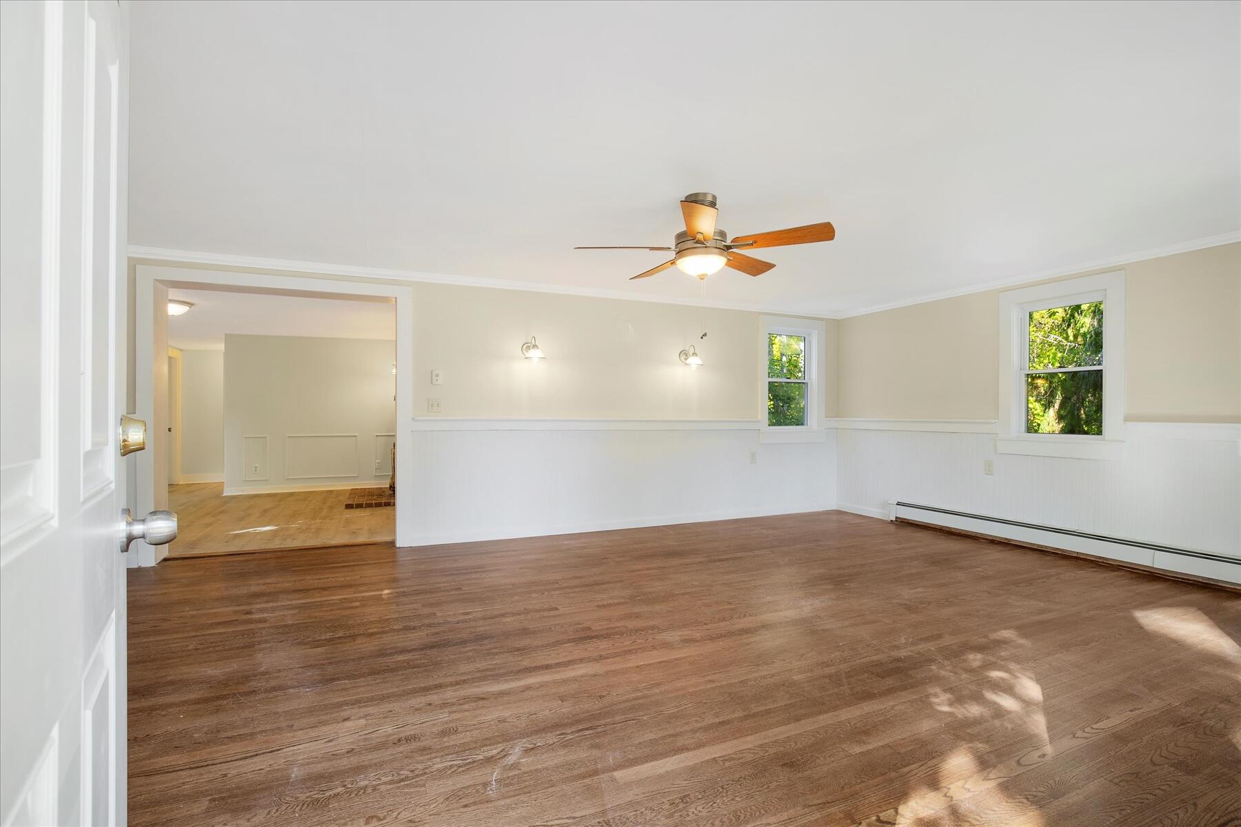 254 Barlows Landing Road Pocasset, MA 02559 - Photo 4 of 27 a view of a livingroom with wooden floor and a window