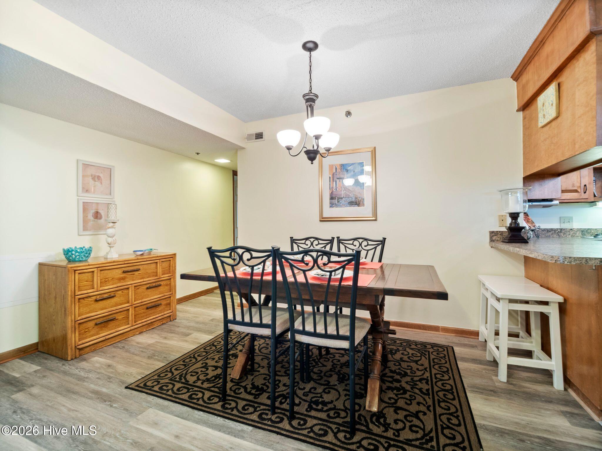 1896 New River Inlet Road, Unit 1119 North Topsail Beach, NC 28460 - Photo 10 of 39 Dining Area