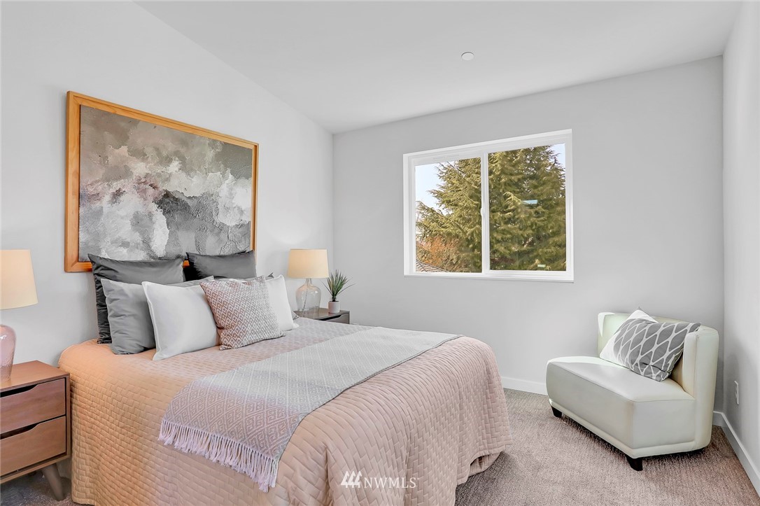 6249 8th Avenue Northwest Seattle, WA 98107 - Photo 14 of 31 a bedroom with a bed and a couch