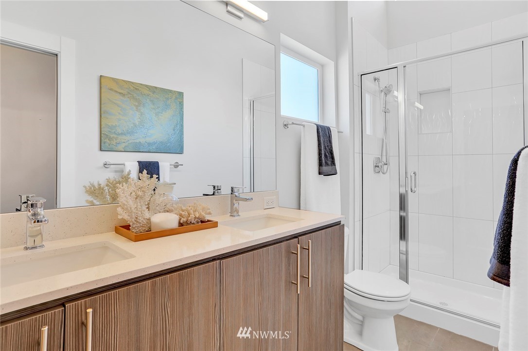 6249 8th Avenue Northwest Seattle, WA 98107 - Photo 17 of 31 a bathroom with a sink a toilet and shower