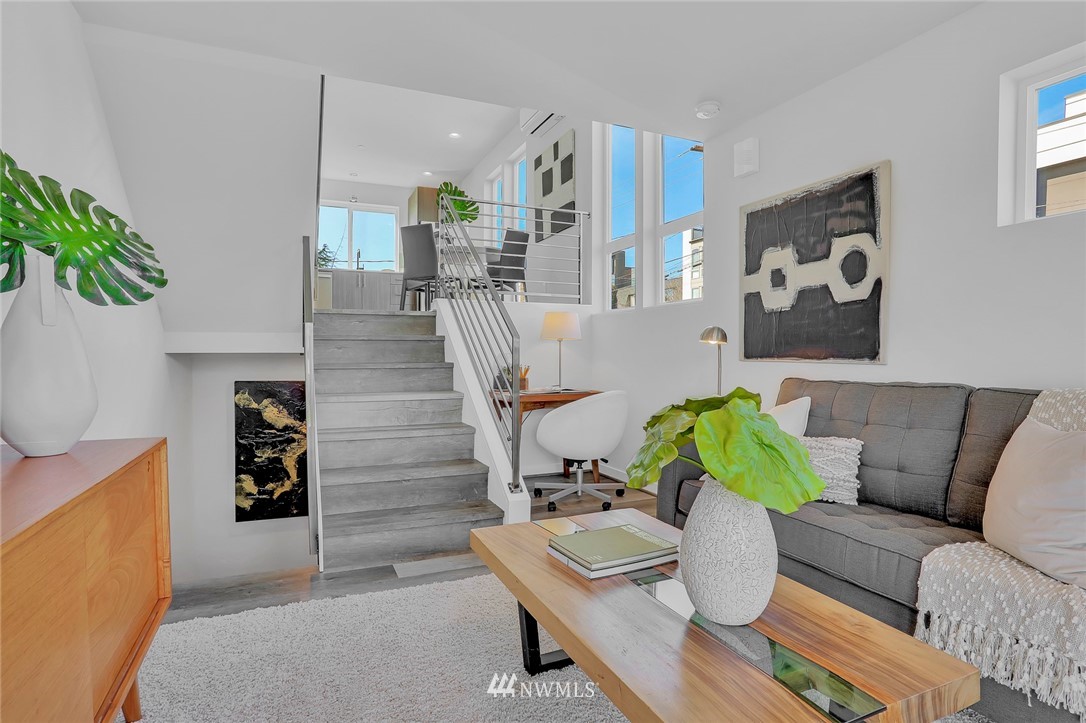 6249 8th Avenue Northwest Seattle, WA 98107 - Photo 5 of 31 a living room with furniture and wooden floor