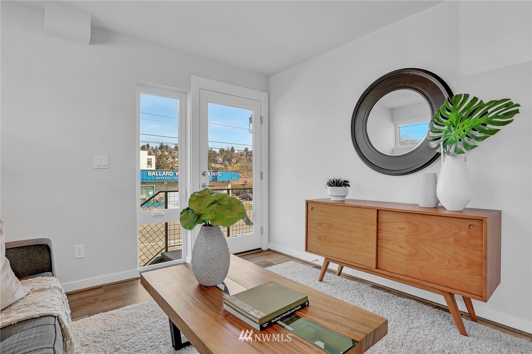 6249 8th Avenue Northwest Seattle, WA 98107 - Photo 7 of 31 a living room with furniture and a window