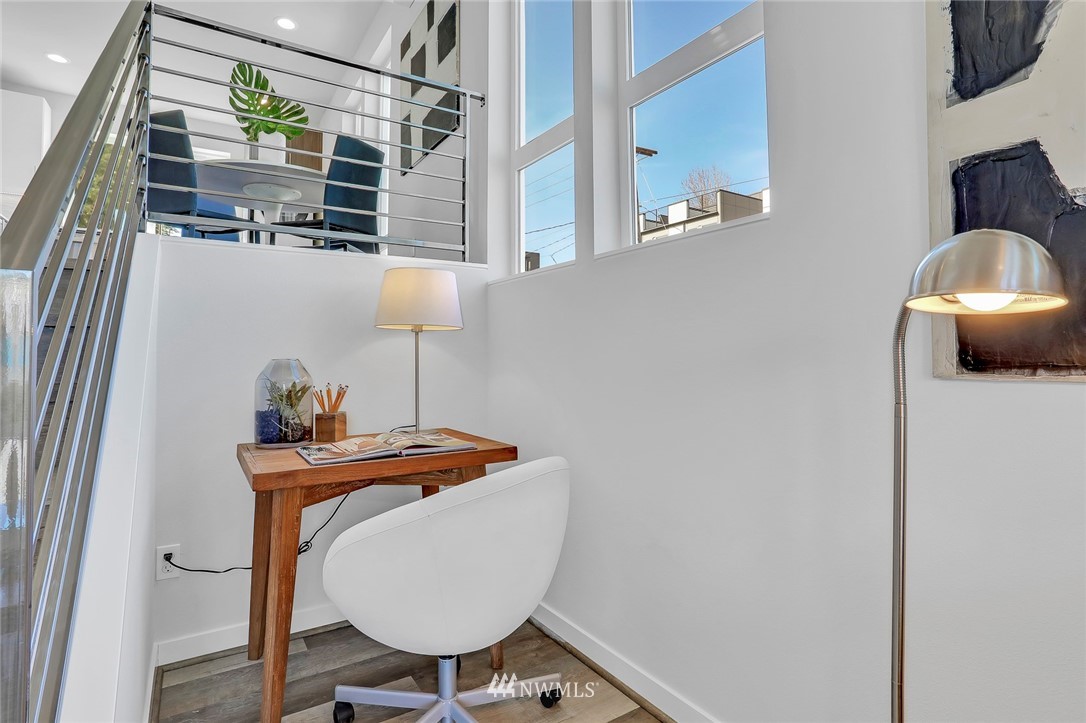 6249 8th Avenue Northwest Seattle, WA 98107 - Photo 8 of 31 a lamp on table and chairs