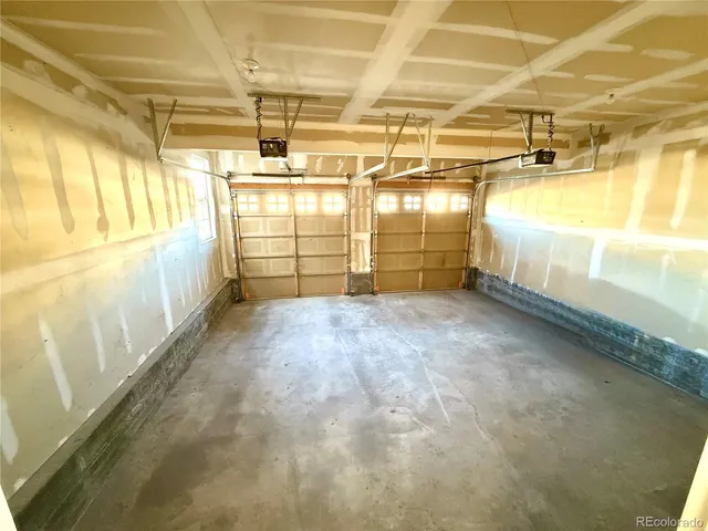 a view of a garage with wooden walls