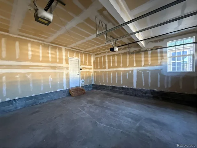 a view of a room with wooden walls