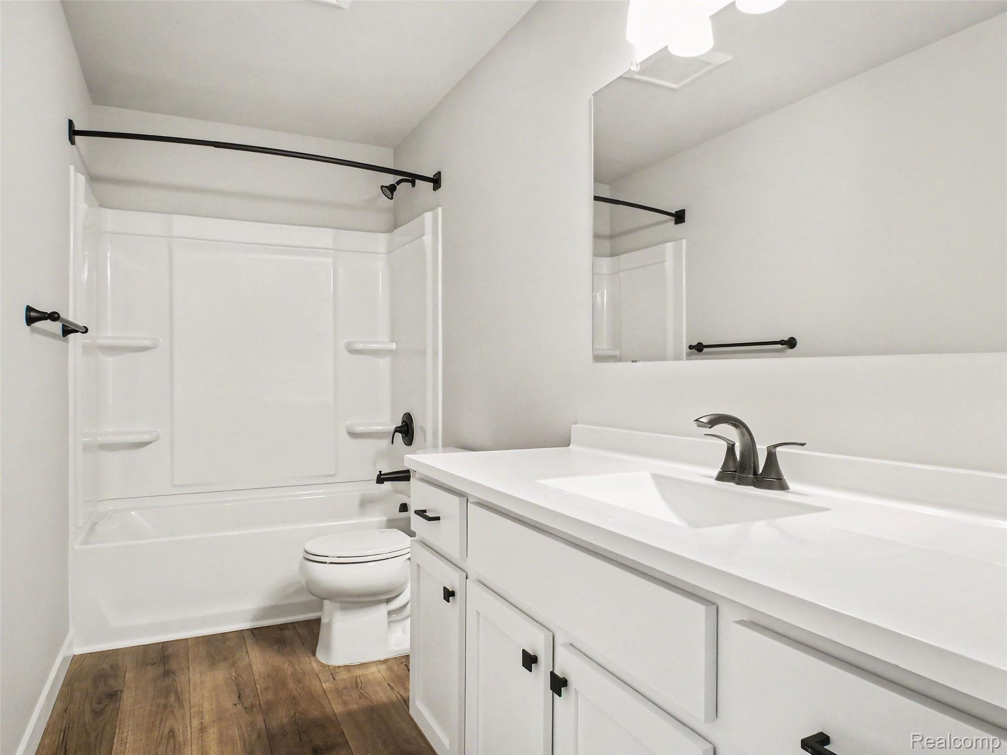 3166 Quail Ridge Court Clio, MI 48420 - Photo 15 of 23 There is a full bath on the lower level, which includes tub/shower combo.