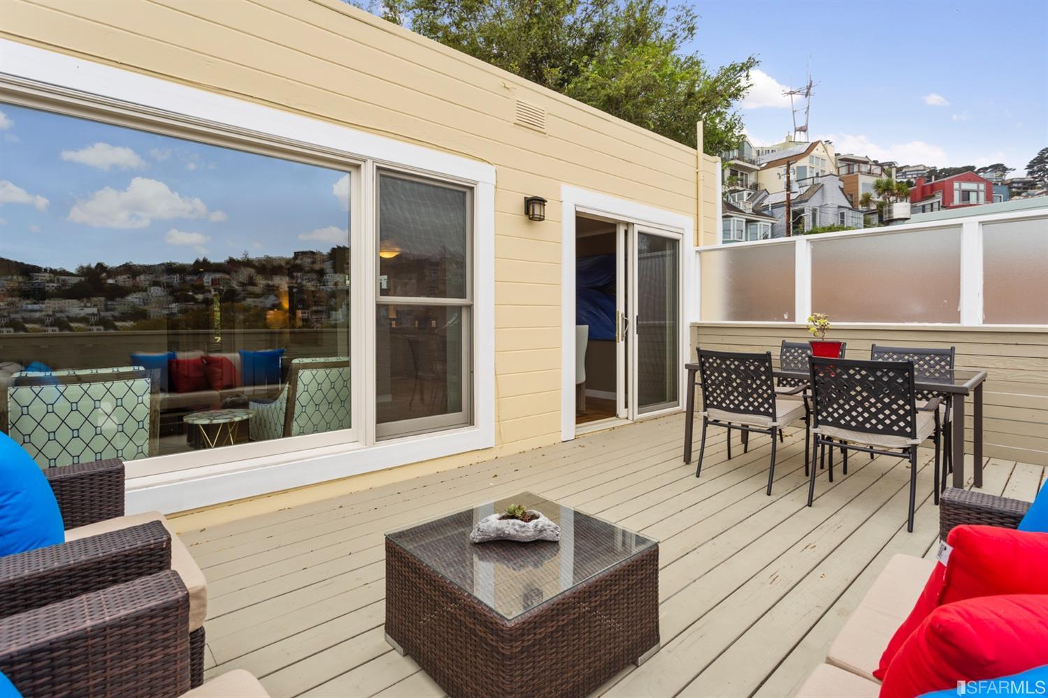 26 Eagle Street San Francisco, CA 94114 - Photo 18 of 56 a outdoor space with patio the couches and a potted plant on dining table