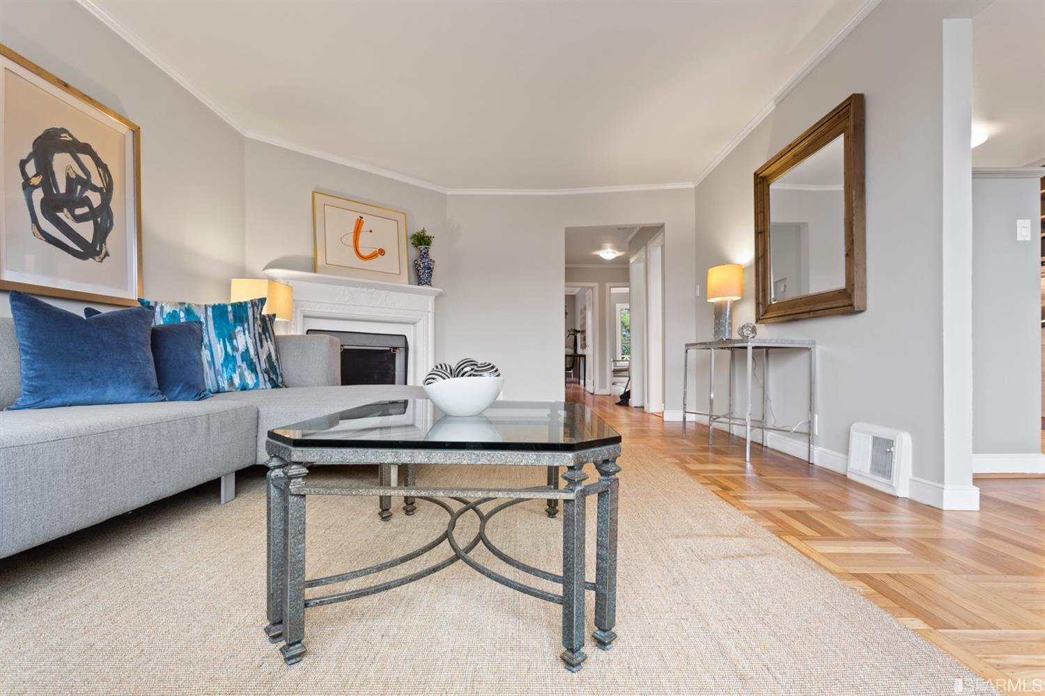 26 Eagle Street San Francisco, CA 94114 - Photo 3 of 56 a living room with furniture and a fireplace