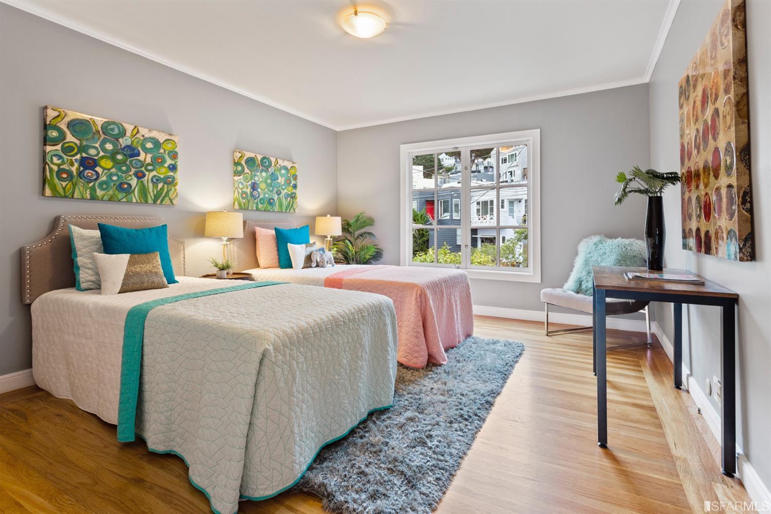 26 Eagle Street San Francisco, CA 94114 - Photo 21 of 56 a bed room with a bed and a chair