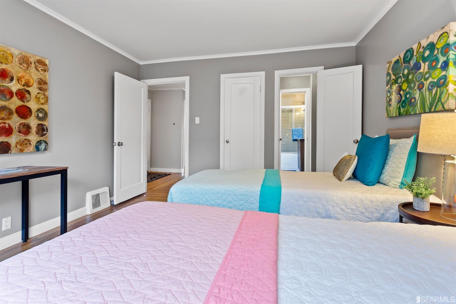 26 Eagle Street San Francisco, CA 94114 - Photo 23 of 56 a bedroom with a bed and a dresser