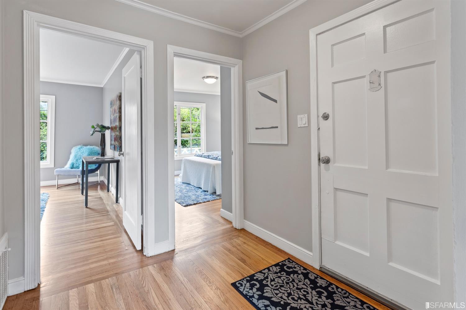 26 Eagle Street San Francisco, CA 94114 - Photo 28 of 56 a view of a hallway with wooden floor and a bathroom
