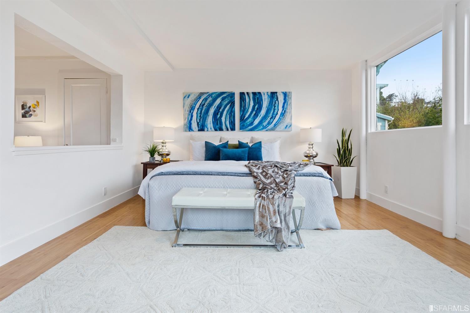 26 Eagle Street San Francisco, CA 94114 - Photo 39 of 56 a bedroom with a bed and a couch