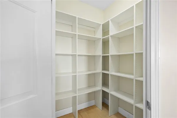 a view of an empty walk in closet