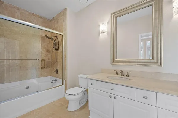 a view of a swimming pool with a lounge chair