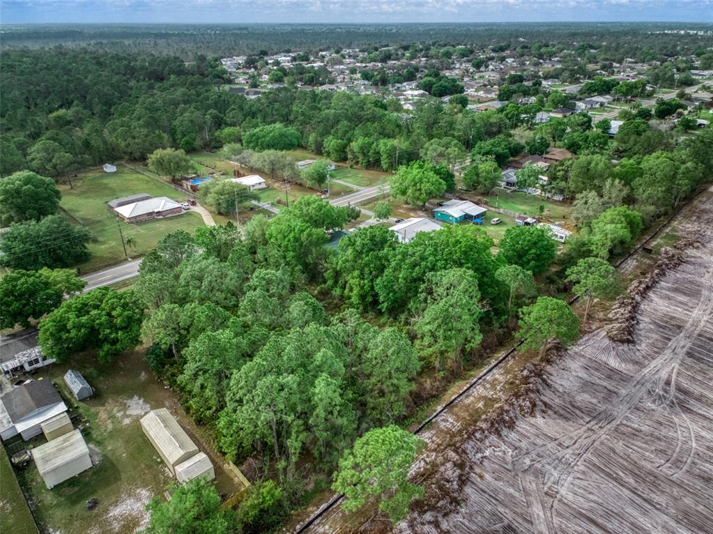 4814 Lakewood Road Sebring, FL 33875 - Photo 13 of 17 an aerial view of multiple house
