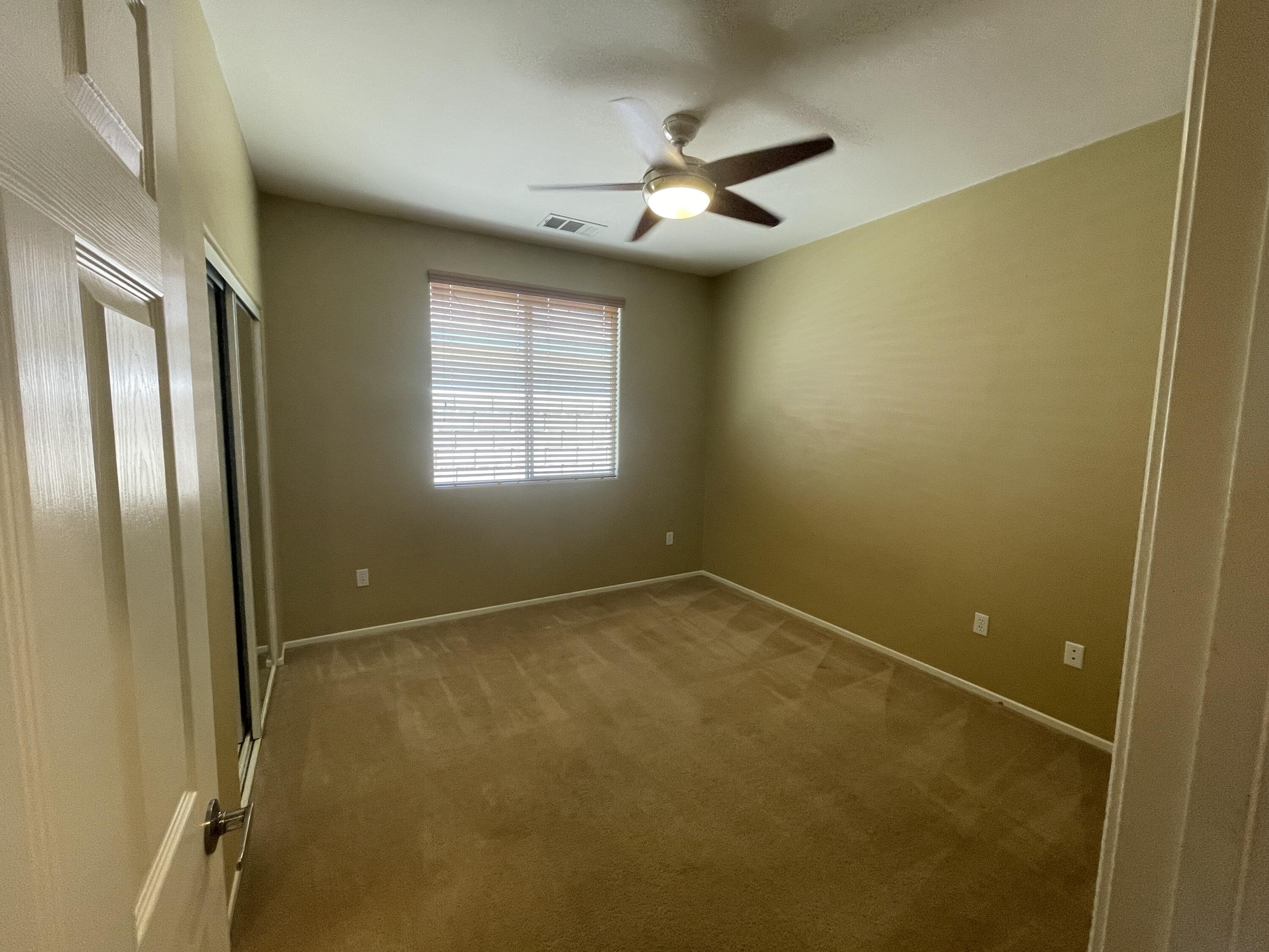82838 Vincent Drive Indio, CA 92203 - Photo 14 of 37 a view of an empty room with a window
