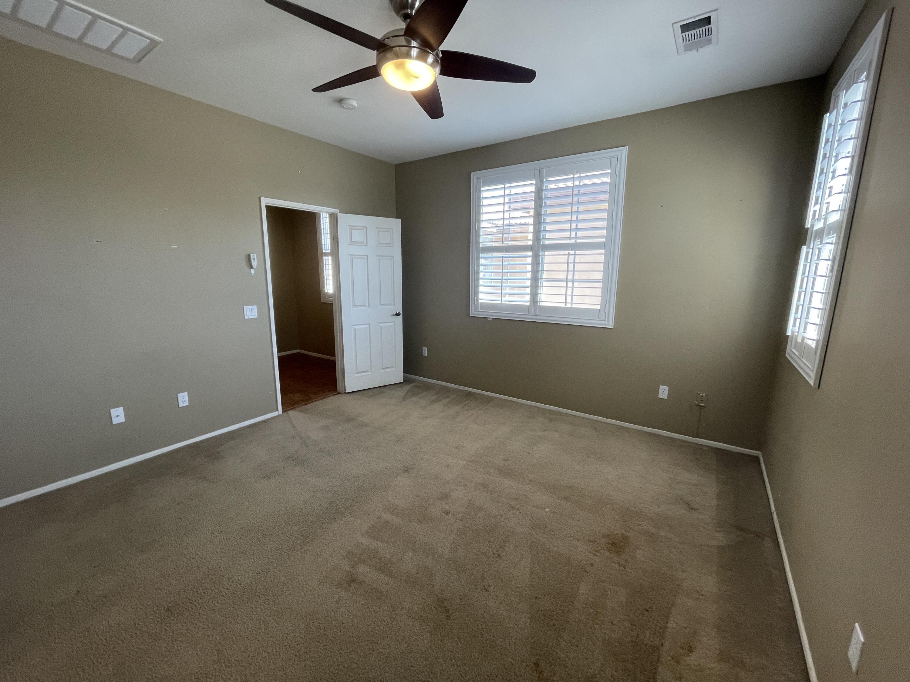 82838 Vincent Drive Indio, CA 92203 - Photo 20 of 37 a view of an empty room with a window