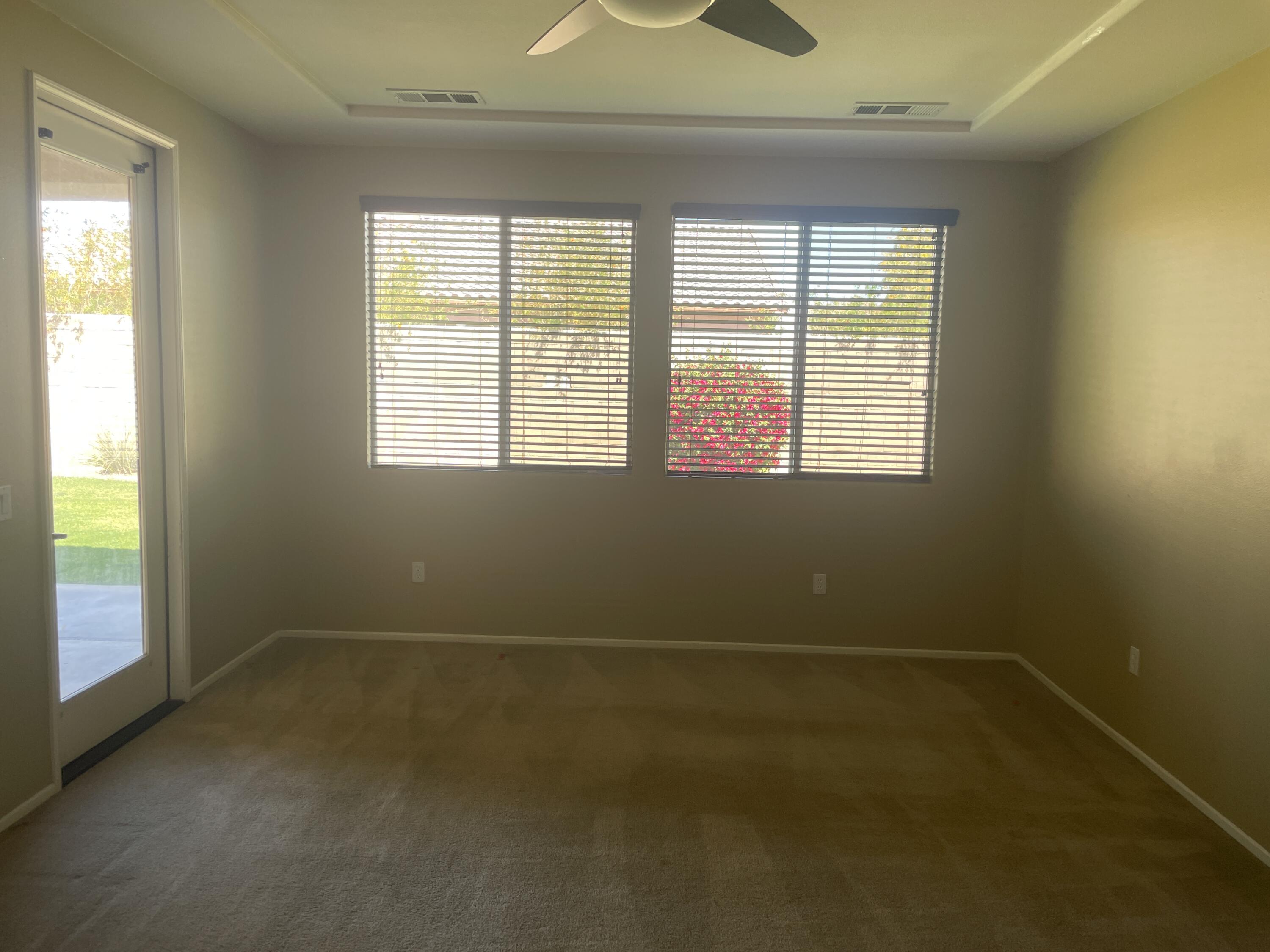 82838 Vincent Drive Indio, CA 92203 - Photo 27 of 37 an empty room with a empty space and windows