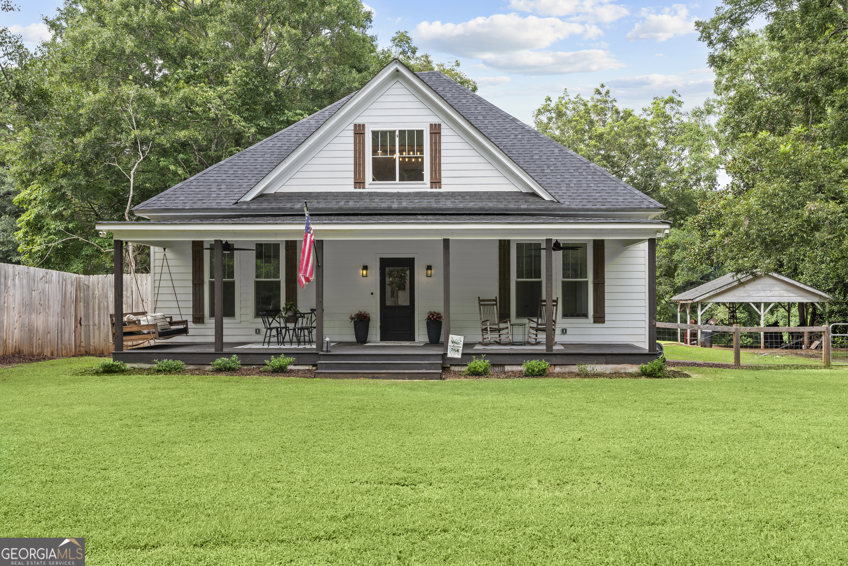 306 West Main Street Rutledge, GA 30663 - Photo 1 of 1 a front view of house with yard and green space