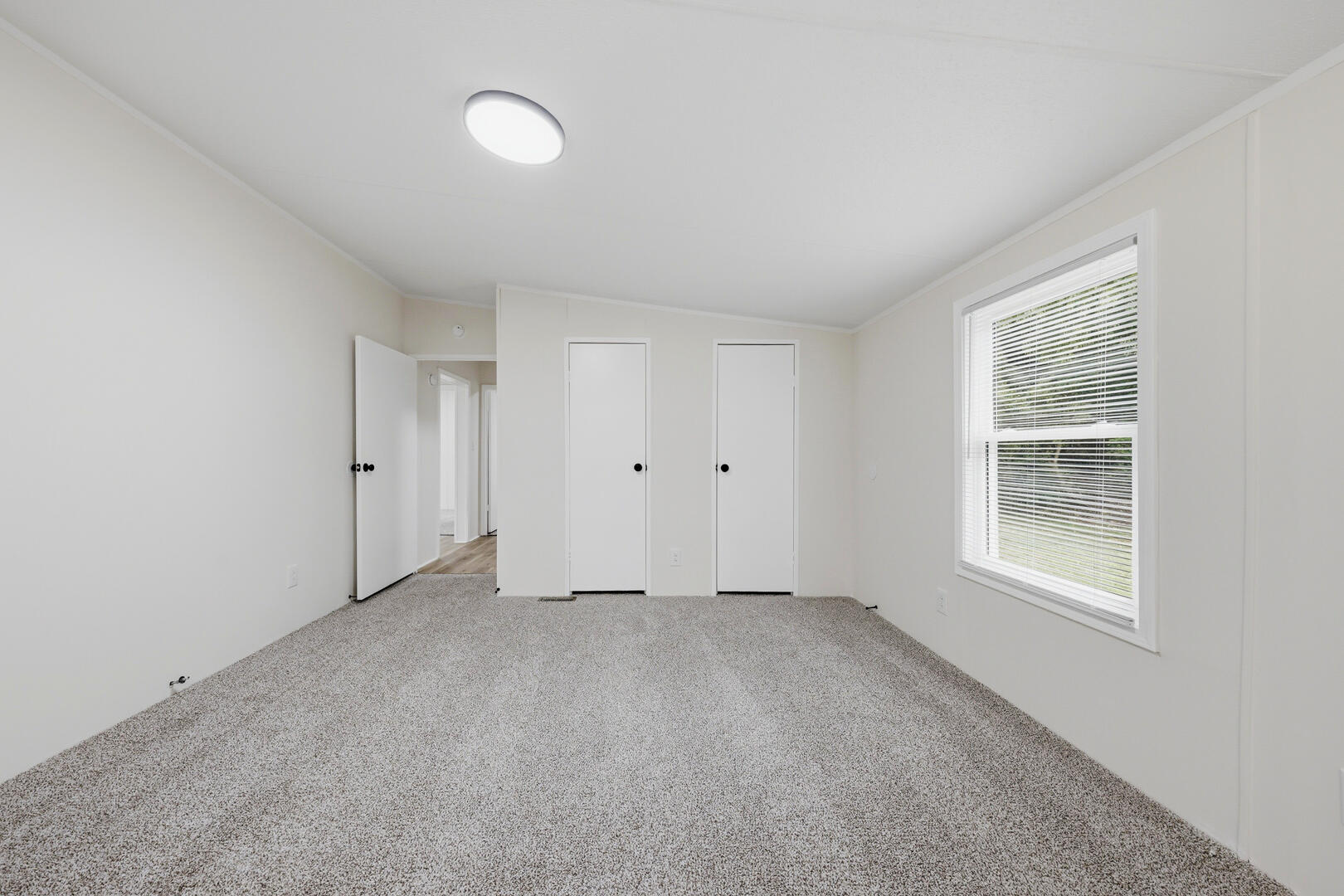 304 Ridgelake Road Goodview, VA 24095 - Photo 23 of 34 a view of an empty room with a window