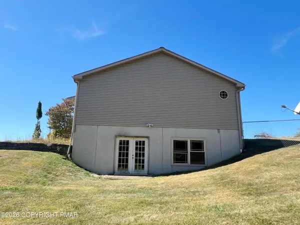 a house with yard in front of it