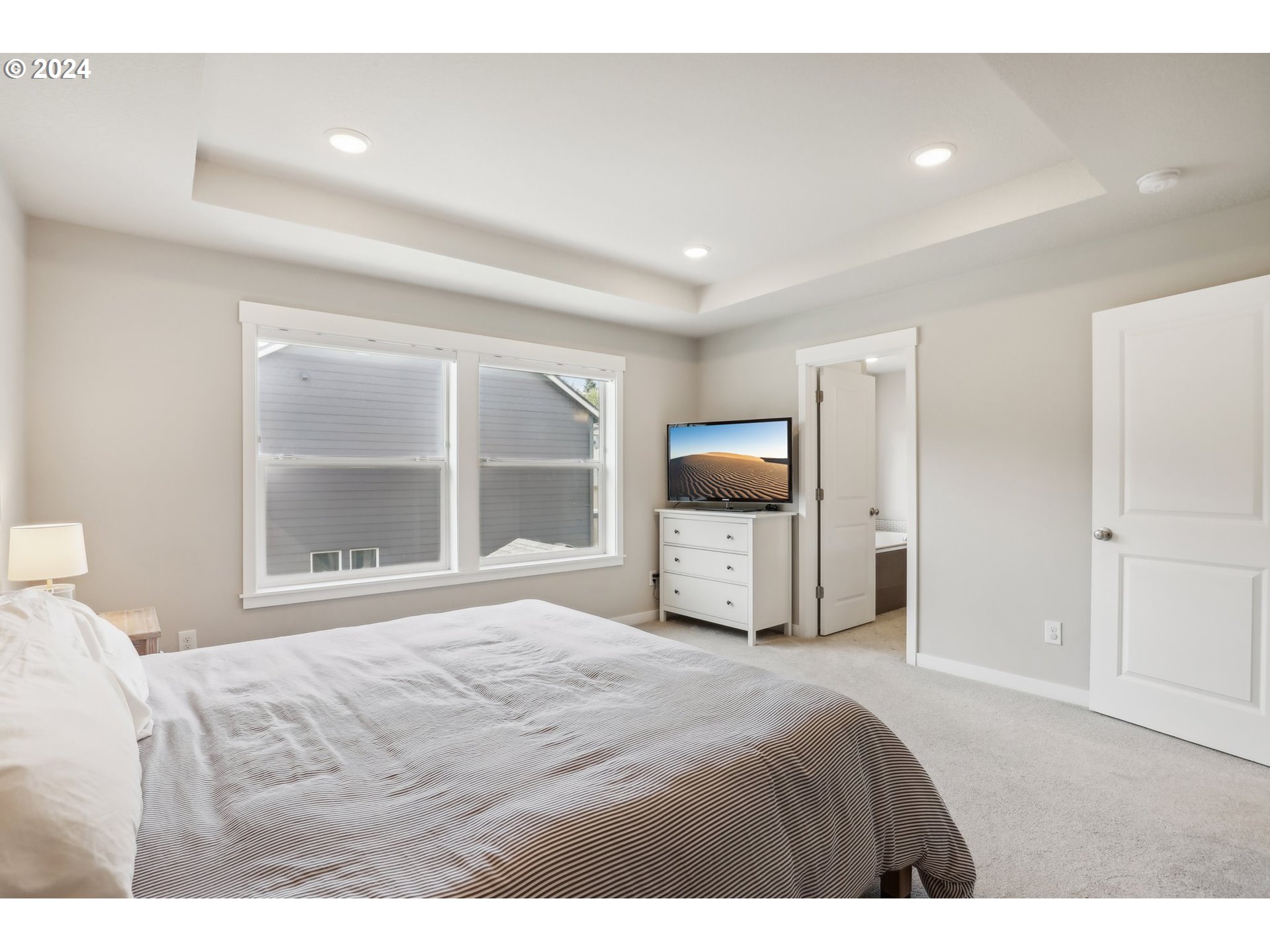 1817 Northeast 171st Street Ridgefield, WA 98642 - Photo 15 of 32 a bedroom with furniture and large window