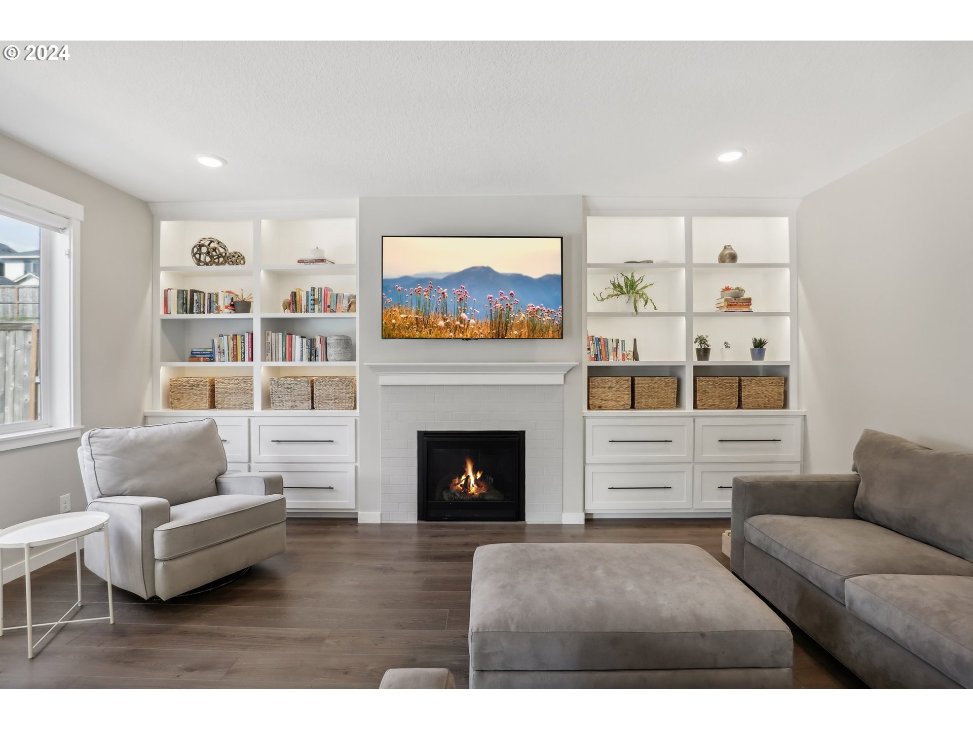 1817 Northeast 171st Street Ridgefield, WA 98642 - Photo 4 of 32 a living room with furniture and a fireplace