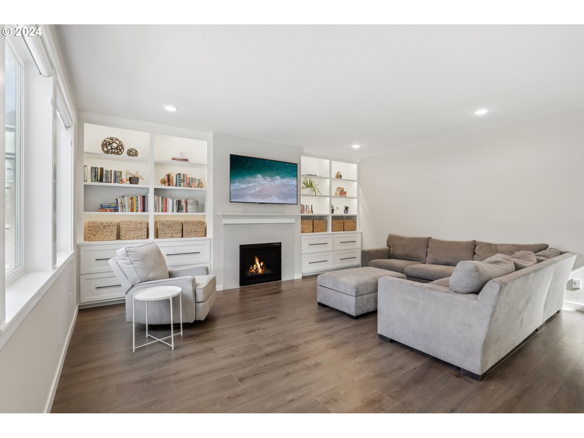 1817 Northeast 171st Street Ridgefield, WA 98642 - Photo 5 of 32 a living room with furniture and a fireplace